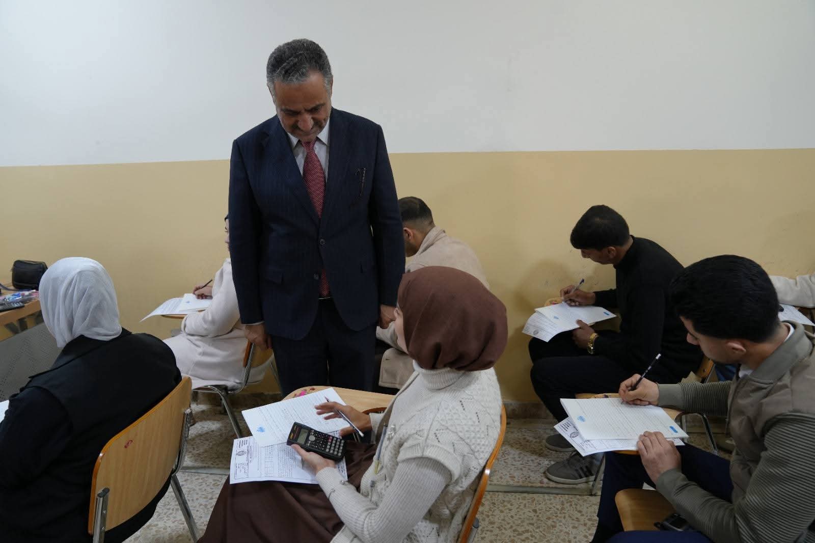 The university president is monitoring the examination process in the colleges.