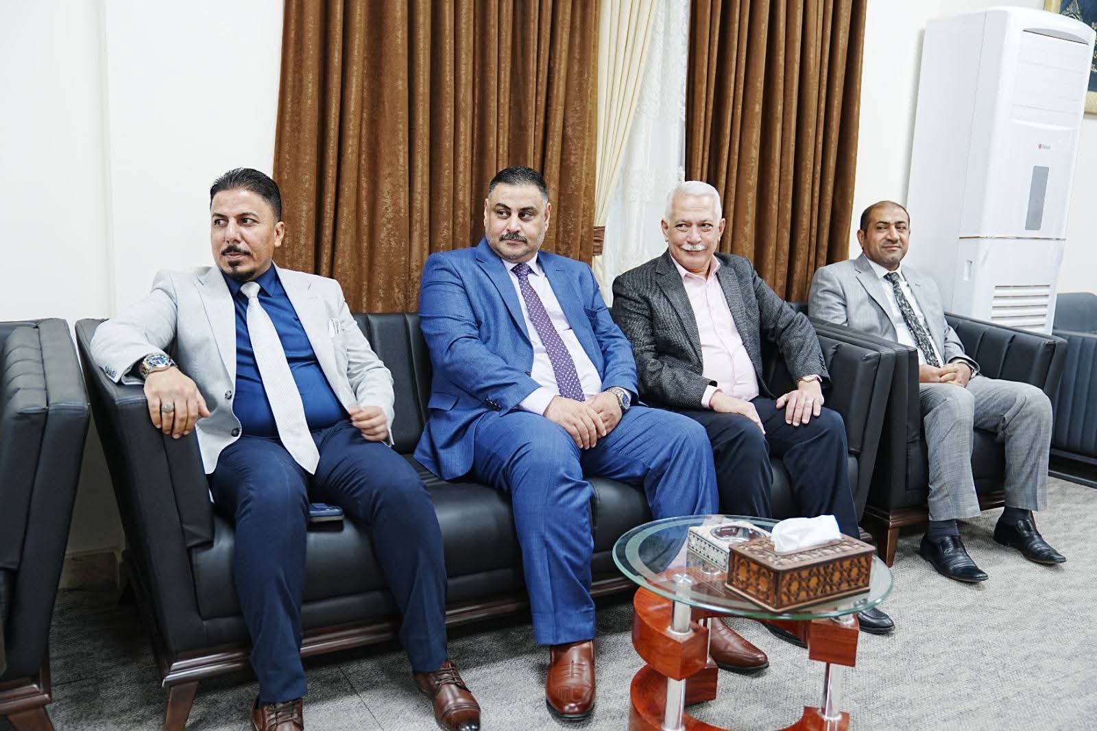 The university president receives a delegation from the Program Accreditation Council.