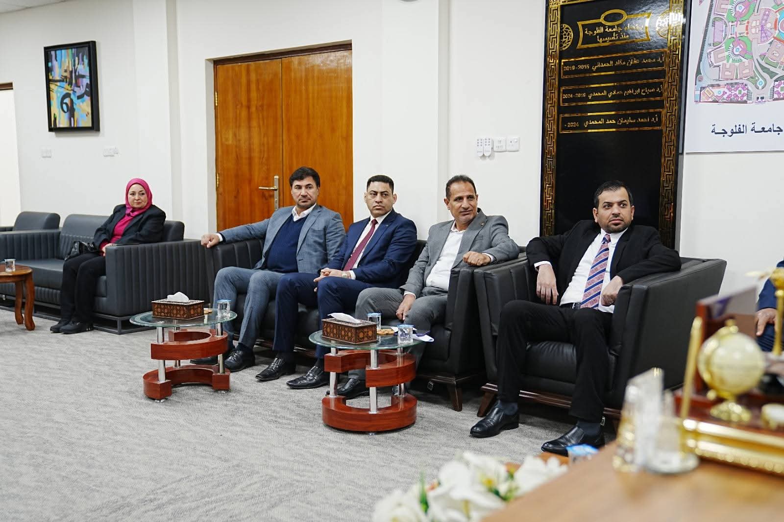 The university president receives a delegation from the Program Accreditation Council.