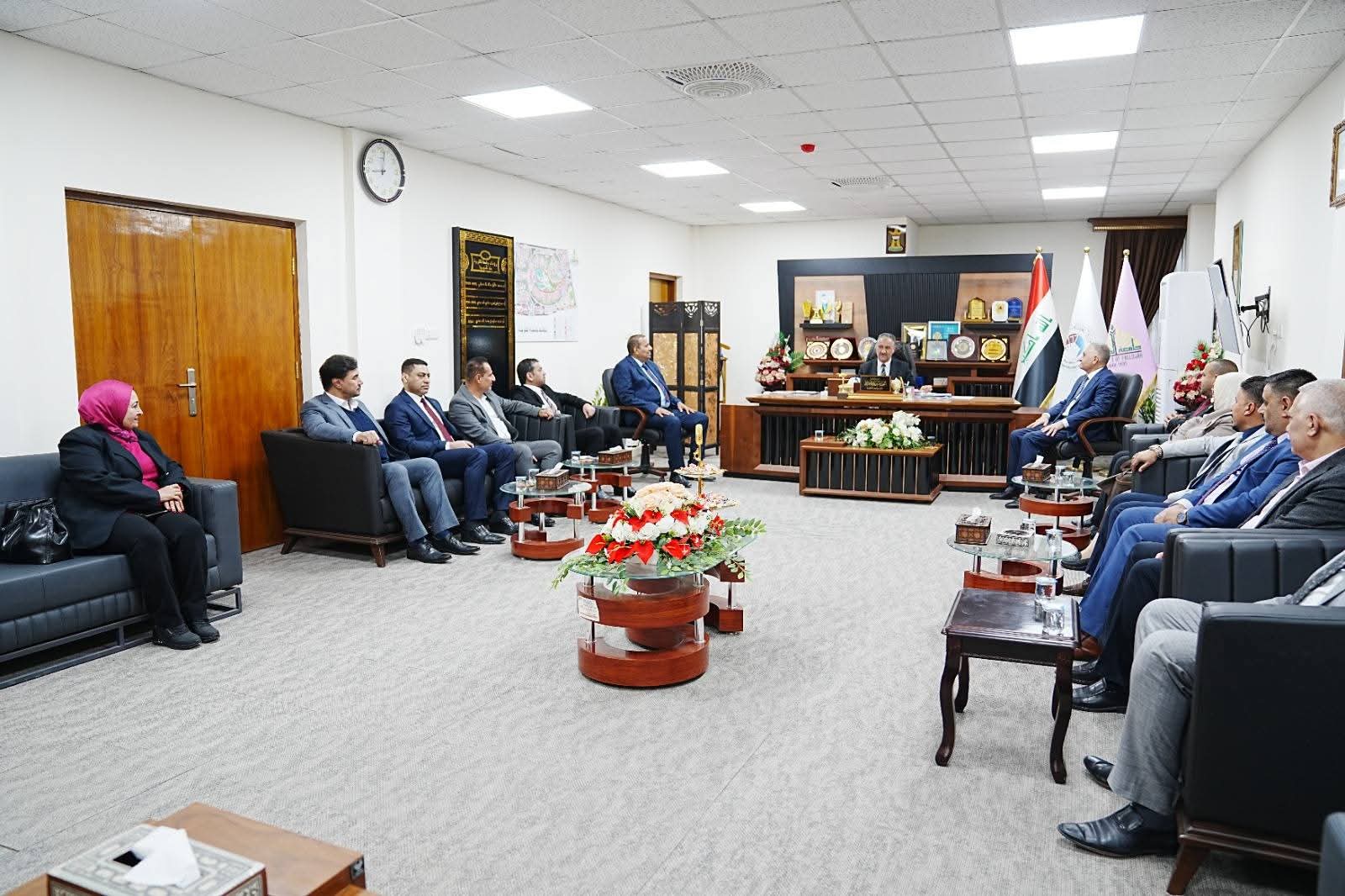 The university president receives a delegation from the Program Accreditation Council.