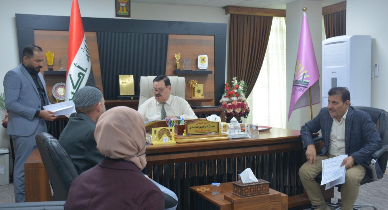 The President of Fallujah University receives a number of citizens and university students in his official office