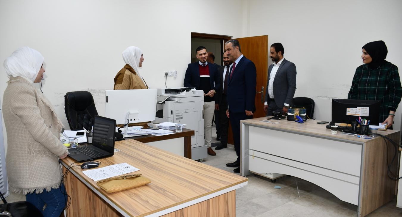 The President of the University of Fallujah inspects the progress of administrative work inside the university presidency building