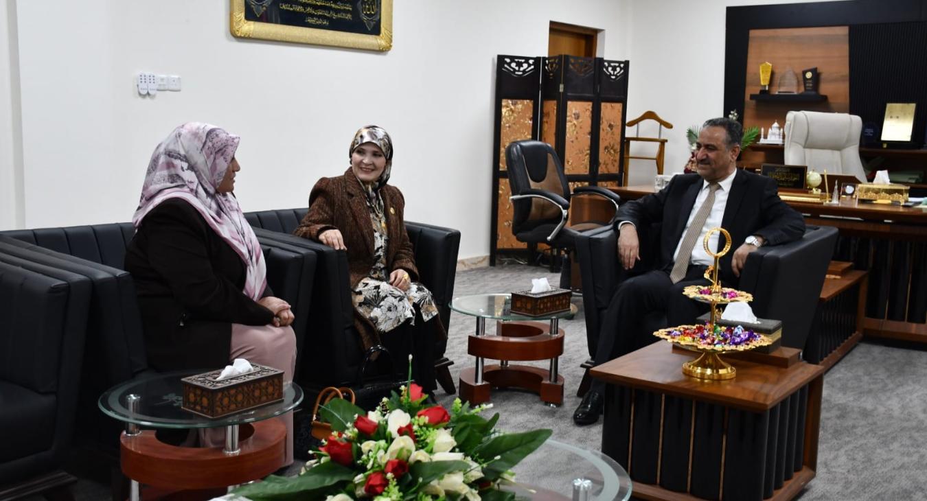 The President of Fallujah University receives Representative Samia Al-Ghalab and member of the Anbar Governorate Council, Souad Al-Obaidi