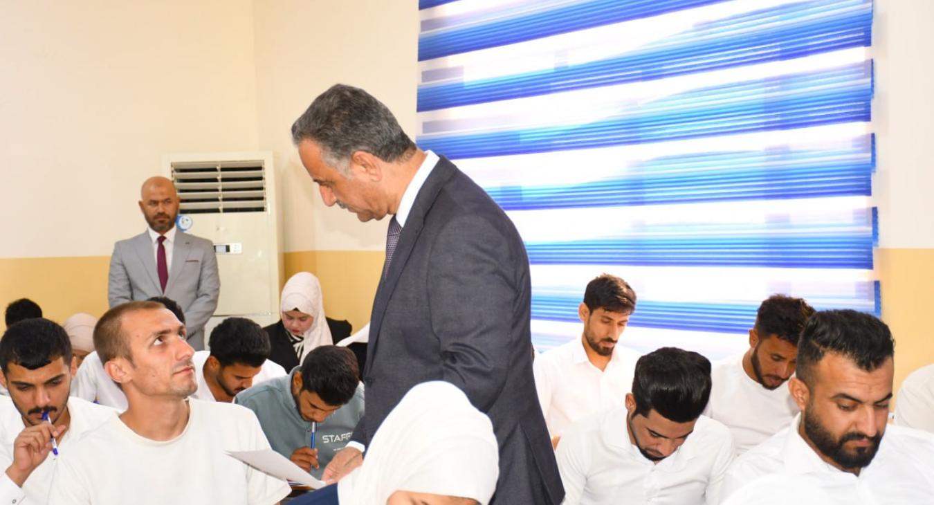 The President of the University of Fallujah inspects the progress of the end of the second semester exams in a number of university colleges