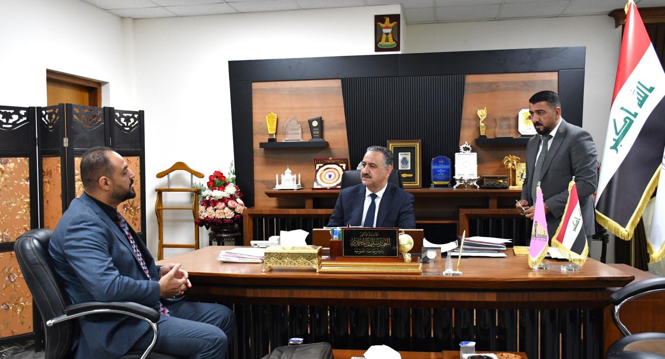 The President of Fallujah University meets with a number of citizens and university students to consider their applications
