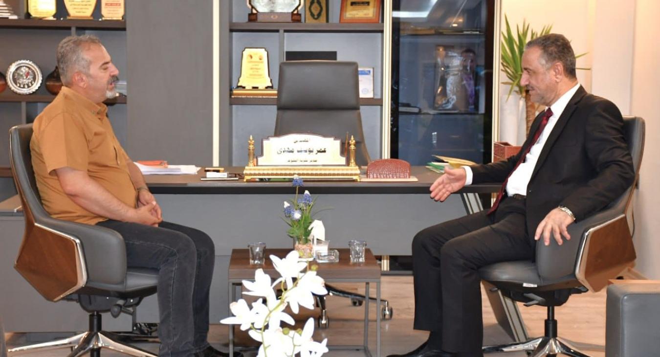 The President of Fallujah University visits the city municipality and discusses with its director ways to enhance joint cooperation